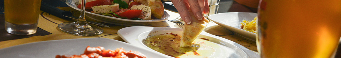 Eating Food Stand at Toastie's Panini Grill restaurant in Richmond, VA.